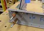 Starting riveting the nose rib/hinge assemblies to the left FL-903 Spar