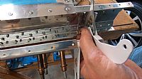 A handy tool for holding tiny washer in tight places