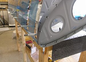 Clecoed in the end rib with the splice strip
