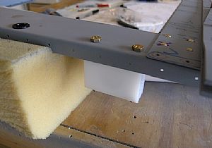 Drilled the F-661EF flap actuator bearing blocks