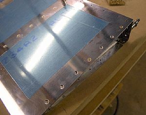 Put in the 2 temporary rivets to hold the ribs in place