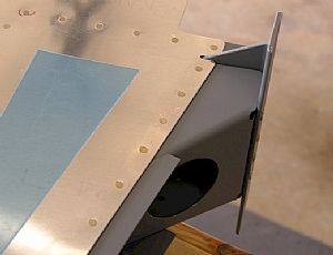 Riveted the skin to the rudder brace