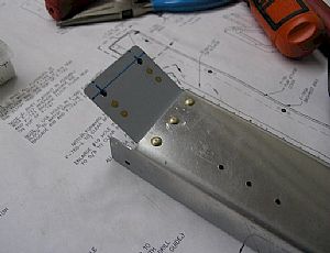 Riveted the nutplates on and installed the F-767 Attach Plate