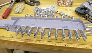 Riveted the E-913 counterbalance skin to the ribs