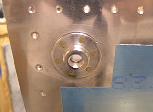 Riveted on the VA-112 drain flange