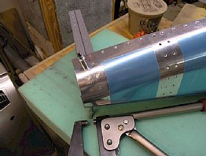 Started riveting the most aft bulkhead assemblies