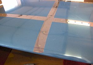 Riveted in the nose ribs on the left Horizontal Stabilizer skin