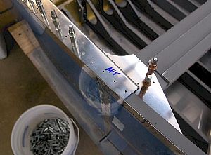 Clecoed the F-721 B side rails and F-757 gussets to the fuselage 